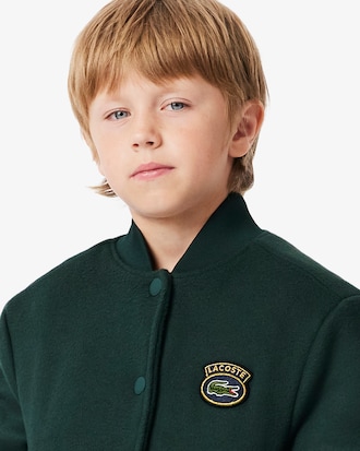 Campera tipo bomber con insignia de cocodrilo