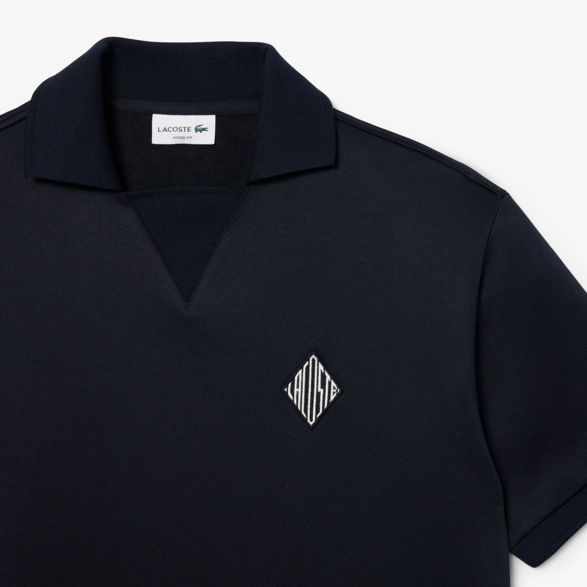Polo em Moletom com aplique bordado - Corte solto