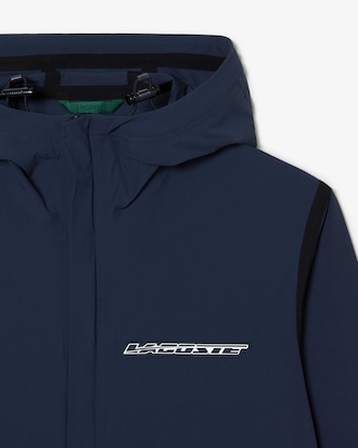 Campera corta de ch&aacute;ndal hombre Lacoste en poliamida reciclada