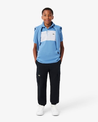 Polo de petit piqu&eacute; con bloques de color