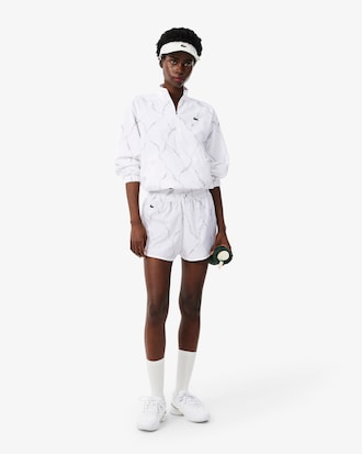 Campera de tenis con estampado de cocodrilo reflectante