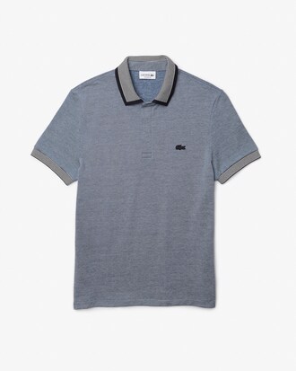 Polo masculina Lacoste Regular Fit em algod&atilde;o com acabamento listrado