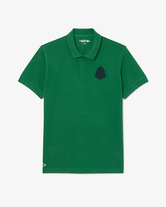 Polo de golf de piqu&eacute; mini con insignia y el&aacute;stico