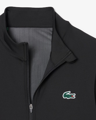 Campera deportiva intermedia de tenis el&aacute;stica con doble tejido y cierre