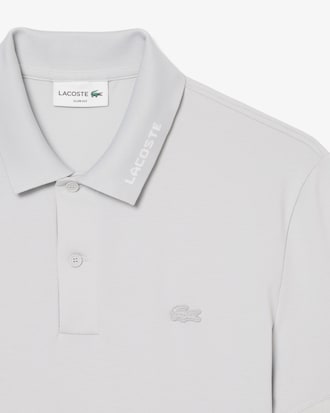 Camisa Polo Piqu&eacute; Modelagem ajustada com Marca em Jacquard