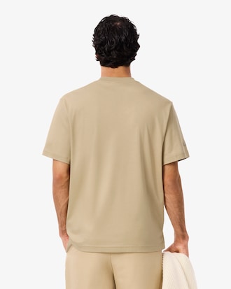 Remera con Firma Bordada