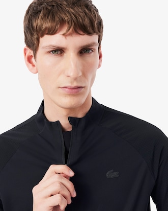 Buzo deportiva con cremallera en tejido el&aacute;stico UltraDry