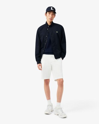 Polo em malha de caimento cl&aacute;ssico