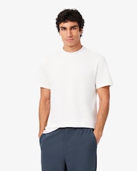 Remera de piqu&eacute; con detalles de marca de jacquard