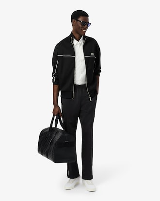 Cal&ccedil;a esportiva em piqu&eacute; com detalhes contrastantes