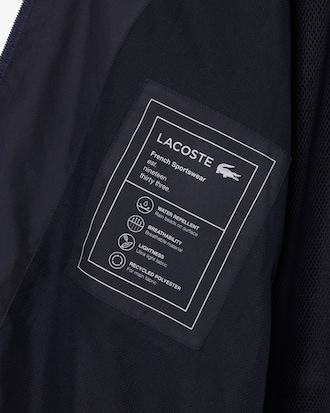 Campera  de ch&aacute;ndal hidr&oacute;fuga con bloques de color