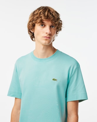 Camiseta unissex em algodão orgânico com decote careca