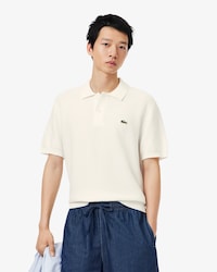 Polo em malha de caimento cl&aacute;ssico