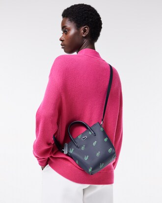 Mini bolsa tote transpassada com estampa de crocodilo